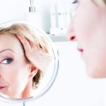 What skin problems can be caused by menopause?